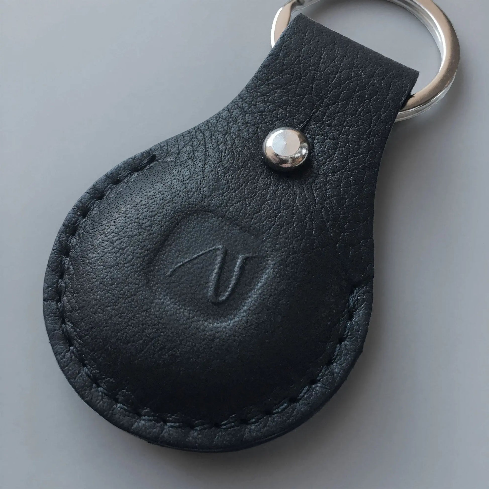 Mini-Aufbewahrungstasche aus echtem Leder mit Schlüsselanhänger color  Schwarz